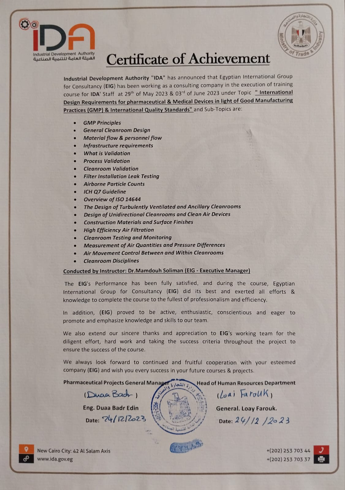 Certificate of Achievement issued by the Industrial Development Authority (IDA) — Ministry of Trade & Industry to Egyptian International Group (EIG) for delivering the training on pharmaceutical & medical device facility design per GMP, May–June 2023 — signed and stamped.